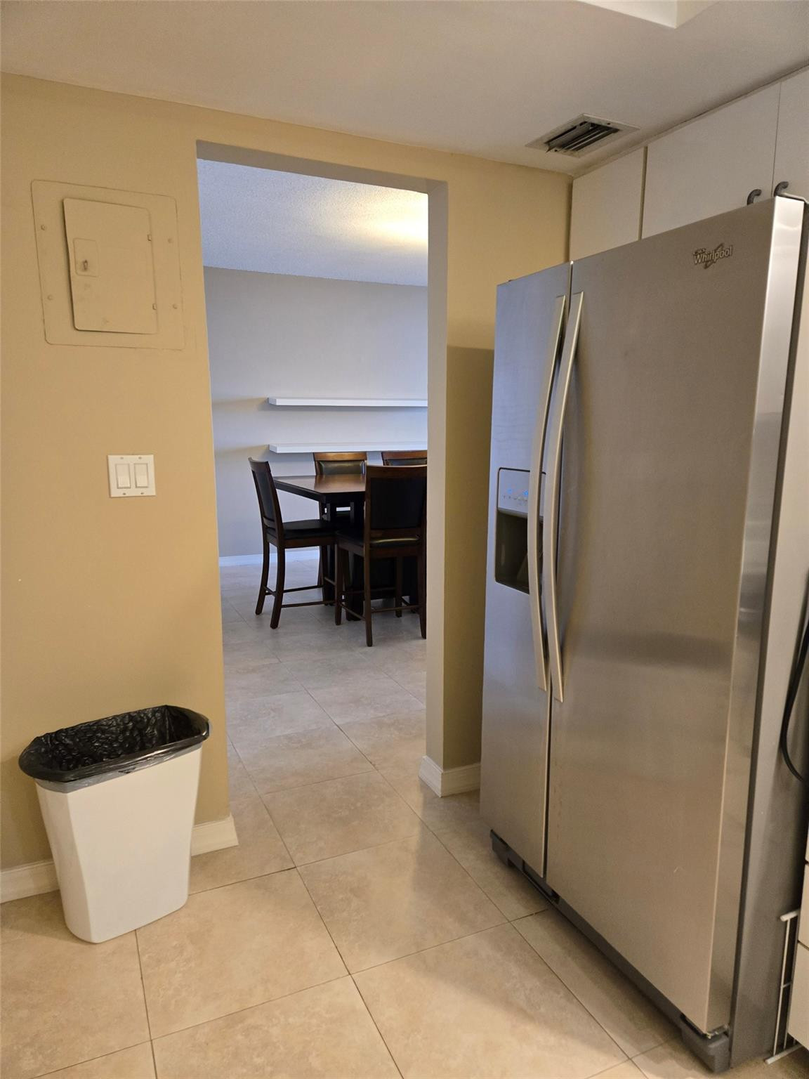 2851 South Ocean Boulevard, Unit 6D Boca Raton, FL 33432 - Photo 14 of 34 a kitchen with stainless steel appliances a refrigerator and a stove