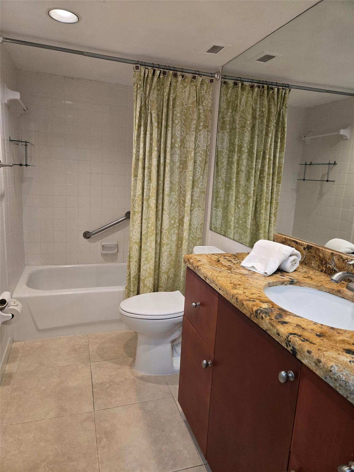2851 South Ocean Boulevard, Unit 6D Boca Raton, FL 33432 - Photo 21 of 34 a bathroom with a granite countertop sink toilet and shower