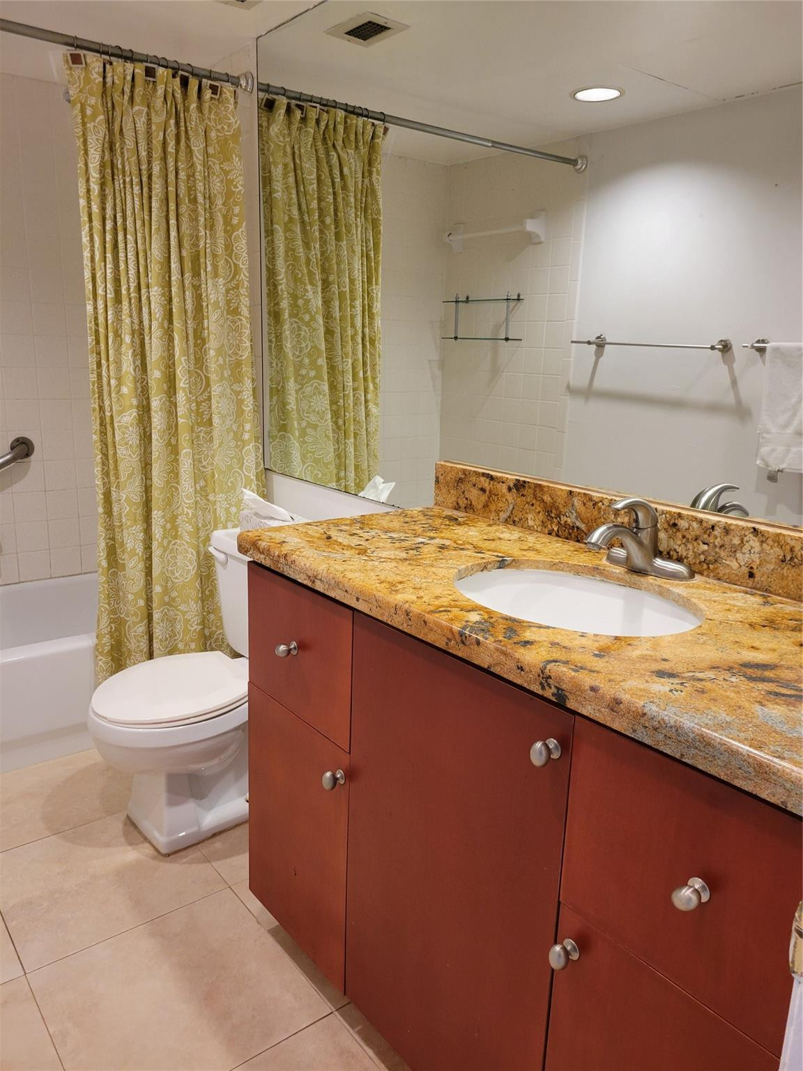 2851 South Ocean Boulevard, Unit 6D Boca Raton, FL 33432 - Photo 23 of 34 a bathroom with a granite countertop sink toilet and shower