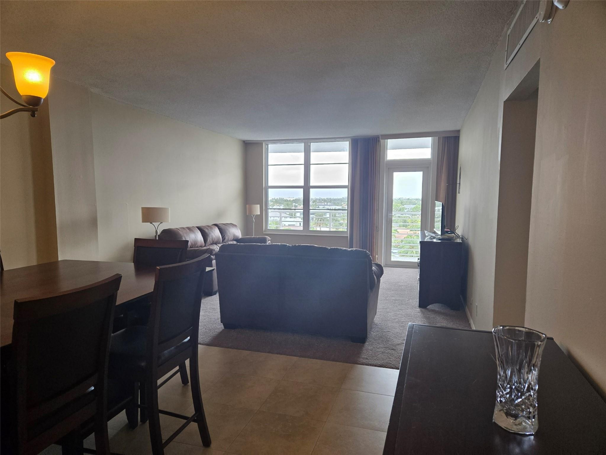 2851 South Ocean Boulevard, Unit 6D Boca Raton, FL 33432 - Photo 31 of 34 a living room with furniture and a window