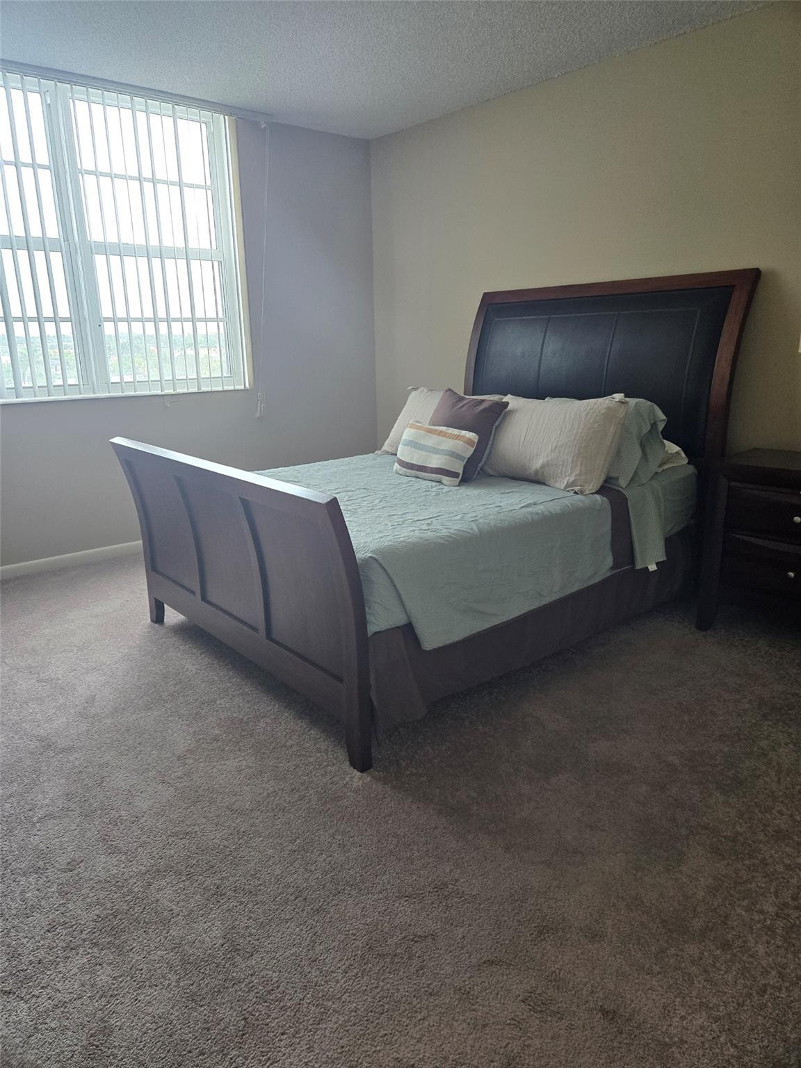 2851 South Ocean Boulevard, Unit 6D Boca Raton, FL 33432 - Photo 33 of 34 a bedroom with a bed and window