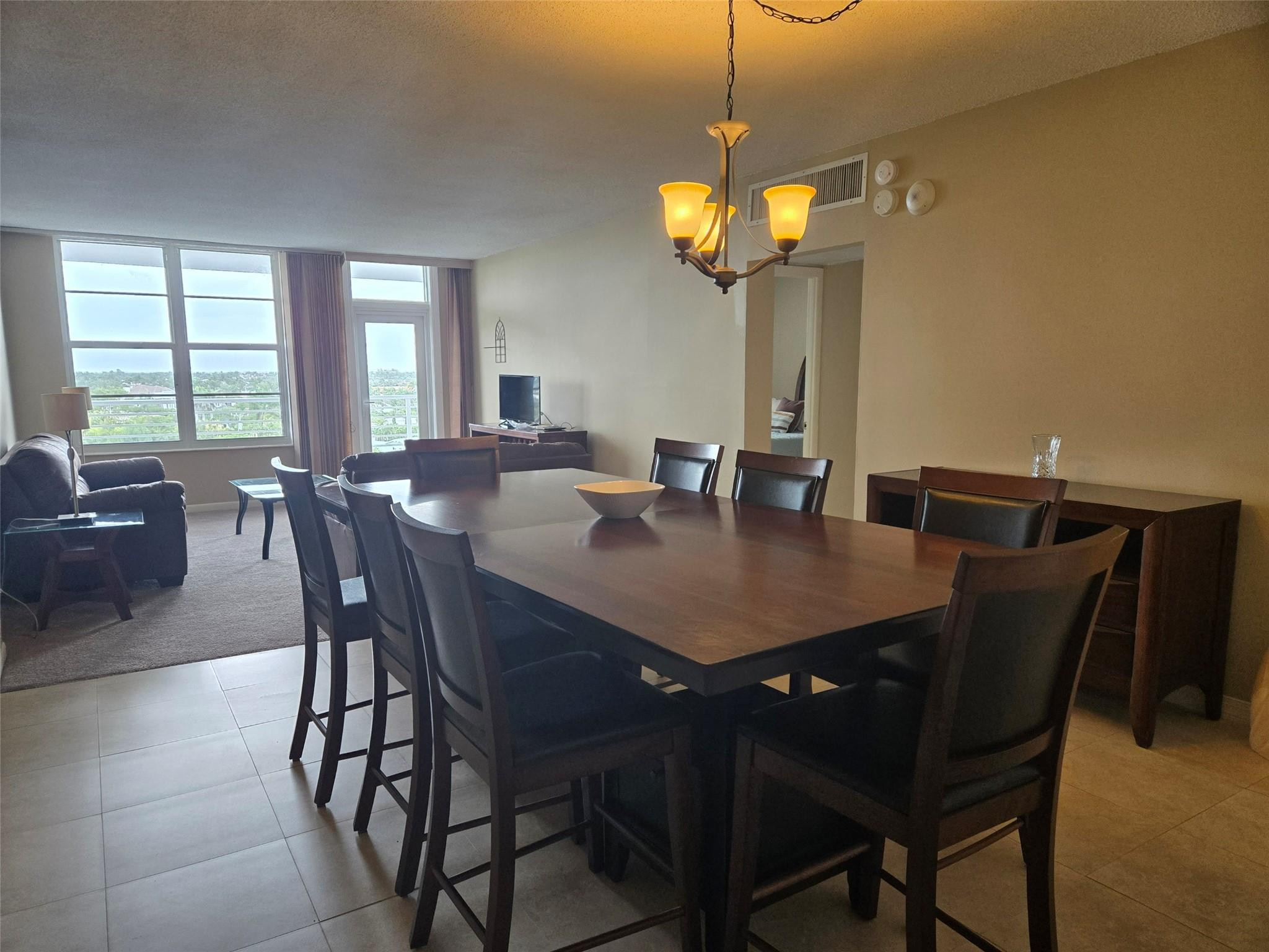 2851 South Ocean Boulevard, Unit 6D Boca Raton, FL 33432 - Photo 5 of 34 a view of a dining room with furniture and window