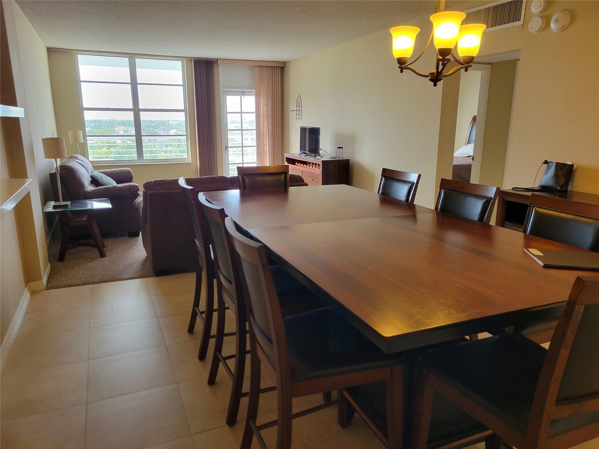 2851 South Ocean Boulevard, Unit 6D Boca Raton, FL 33432 - Photo 7 of 34 a view of a dining room with furniture and window