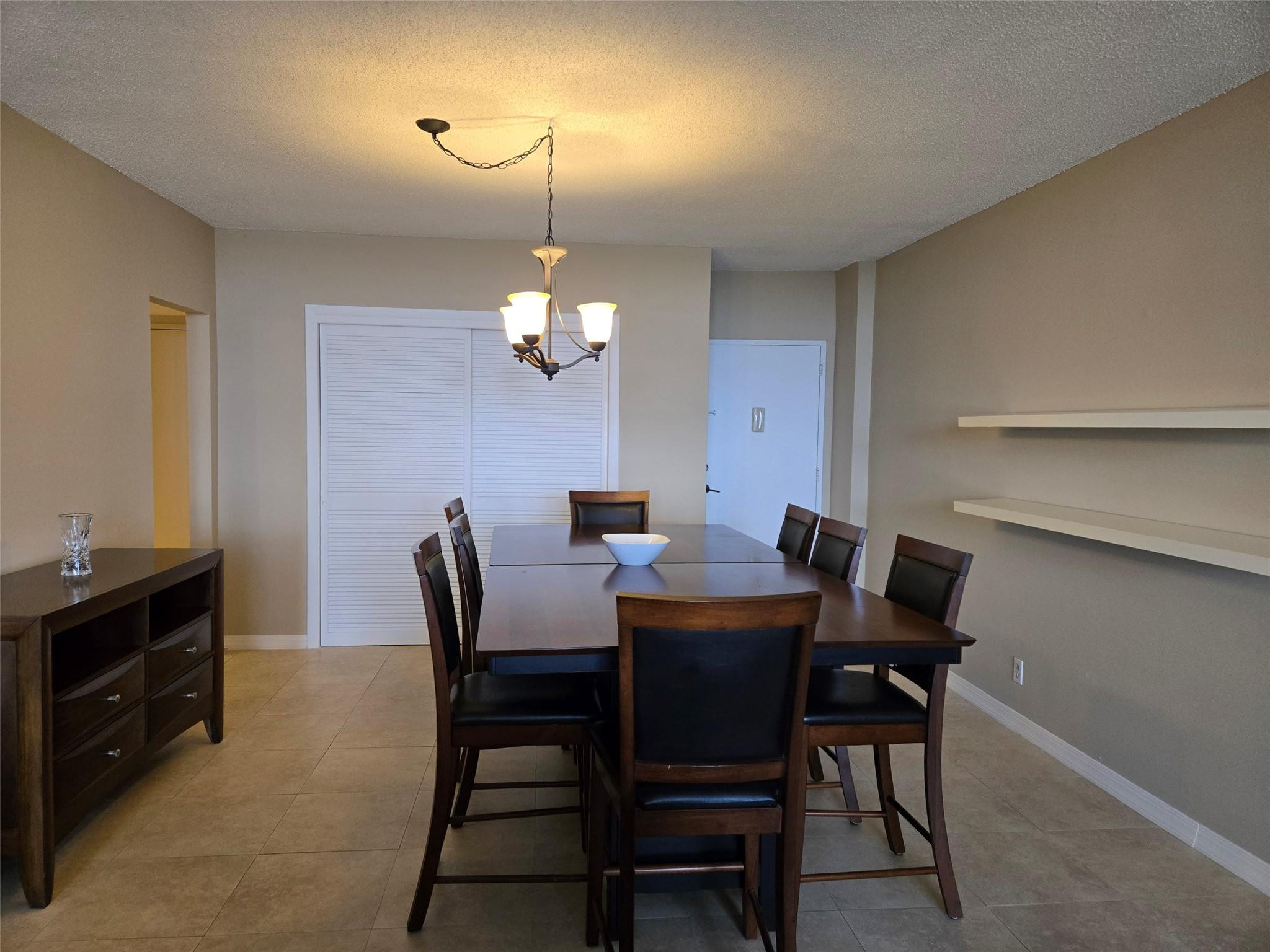 2851 South Ocean Boulevard, Unit 6D Boca Raton, FL 33432 - Photo 9 of 34 a view of a dining room with furniture and wooden floor