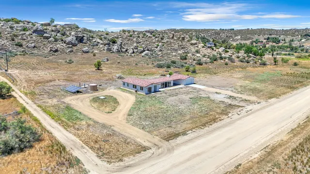 a view of a swimming pool with a lake view