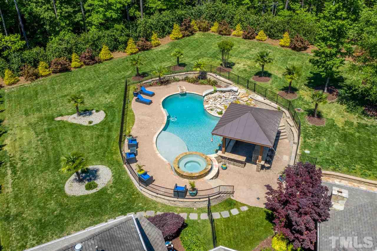 12515 Tuscan Lake Road Raleigh, NC 27613 - Photo 2 of 30 an aerial view of a house with garden space and street view