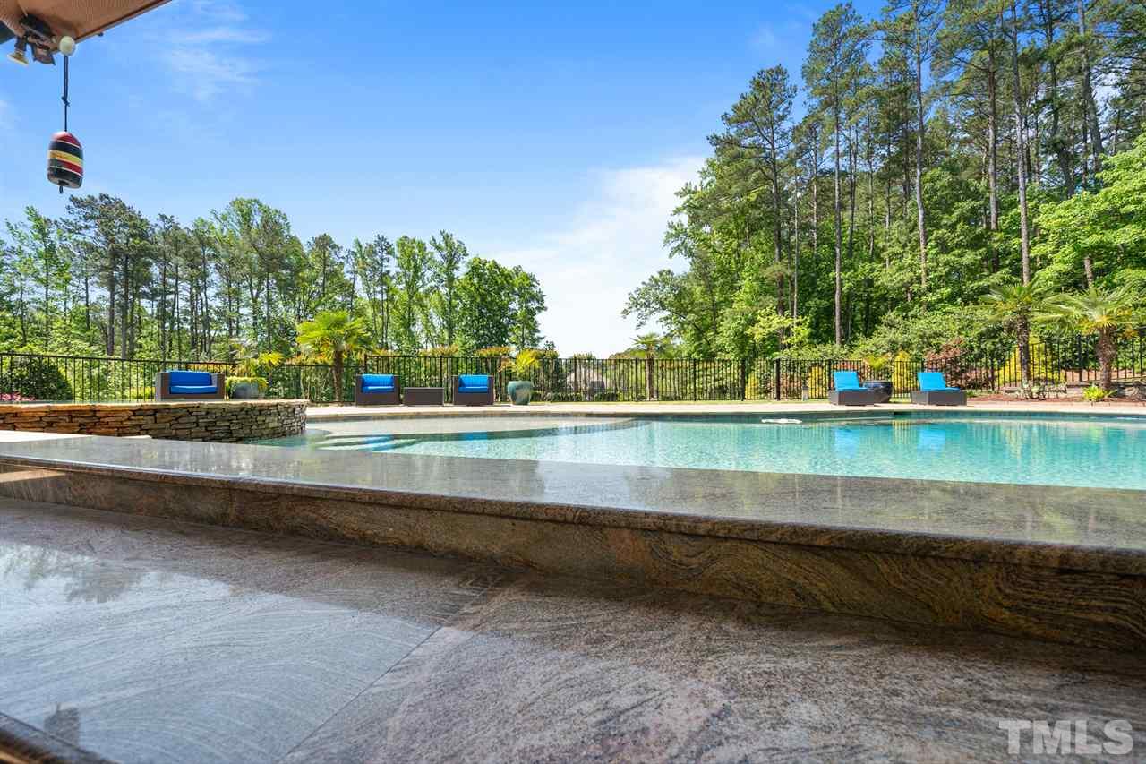 12515 Tuscan Lake Road Raleigh, NC 27613 - Photo 11 of 30 a view of yard with lake view