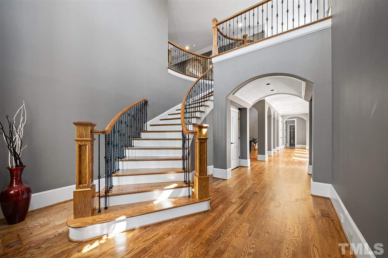 12515 Tuscan Lake Road Raleigh, NC 27613 - Photo 12 of 30 a view of entryway and hall with wooden floor