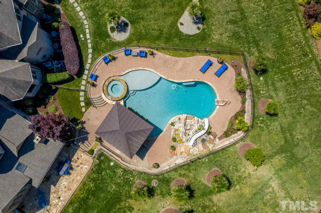 12515 Tuscan Lake Road Raleigh, NC 27613 - Photo 3 of 30 an aerial view of a house with garden space and street view