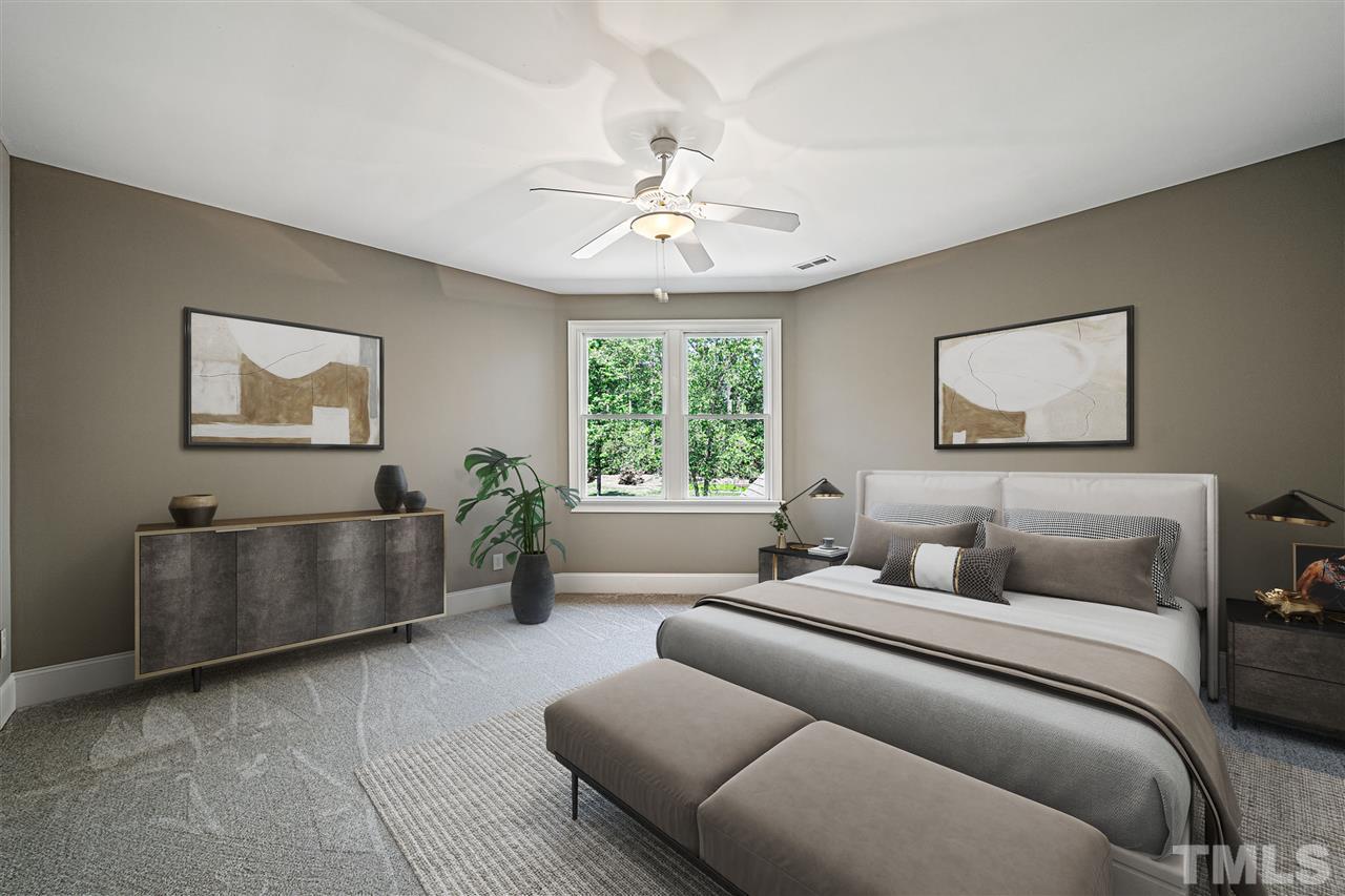 12515 Tuscan Lake Road Raleigh, NC 27613 - Photo 25 of 30 a living room with furniture and a window