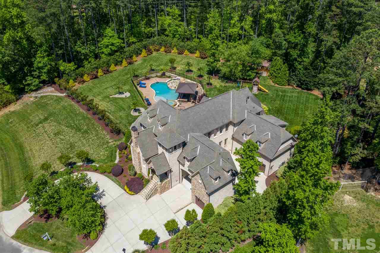 12515 Tuscan Lake Road Raleigh, NC 27613 - Photo 4 of 30 an aerial view of a house with a yard