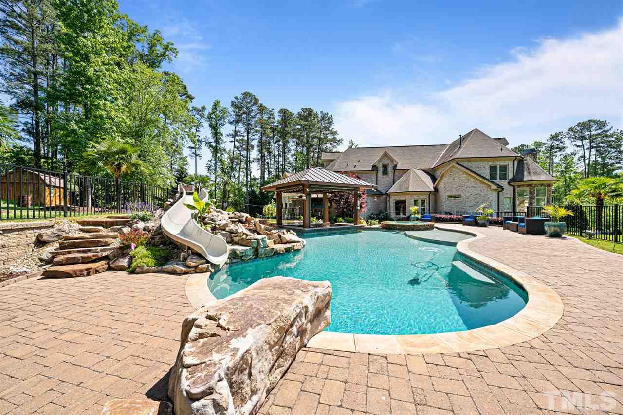 12515 Tuscan Lake Road Raleigh, NC 27613 - Photo 9 of 30 a view of outdoor space yard and swimming pool