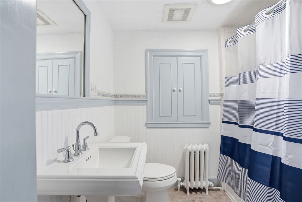 34 Governor Long Road Hingham, MA 02043 - Photo 19 of 37 a bathroom with a sink toilet and shower