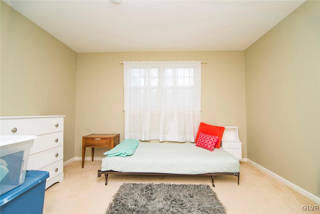650 Williams Road Nazareth, PA 18064 - Photo 20 of 44 a bedroom with a bed and a dresser in it