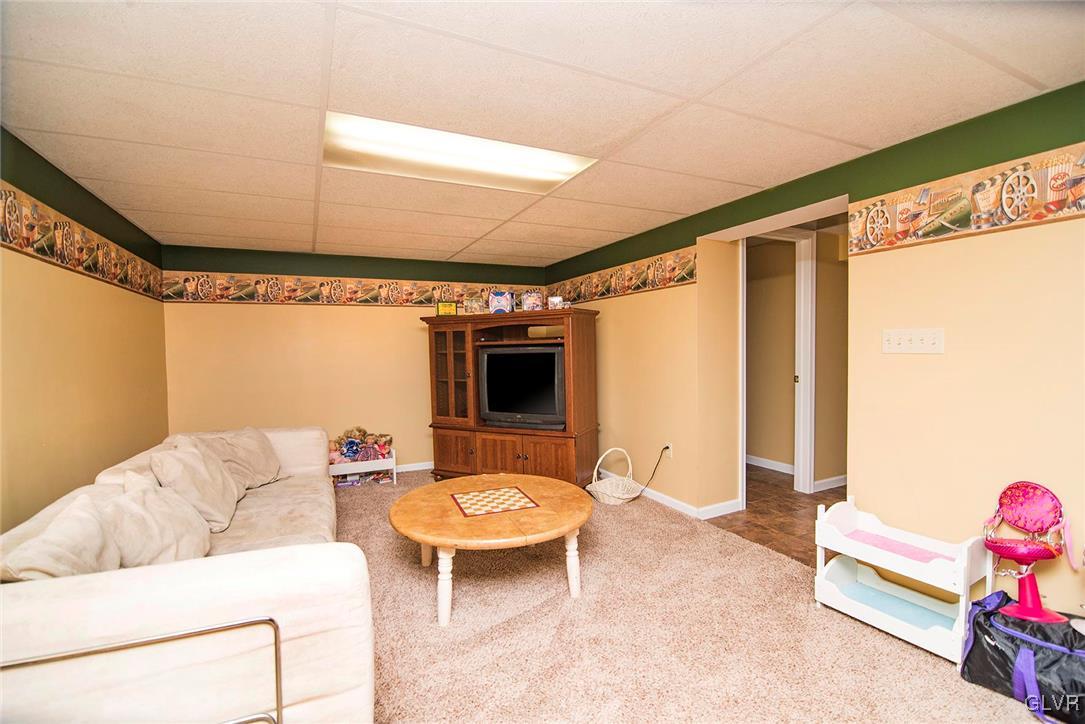 650 Williams Road Nazareth, PA 18064 - Photo 36 of 44 a living room with furniture and a flat screen tv