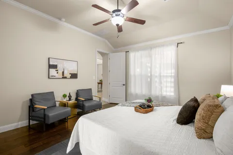 a view of a house with a backyard