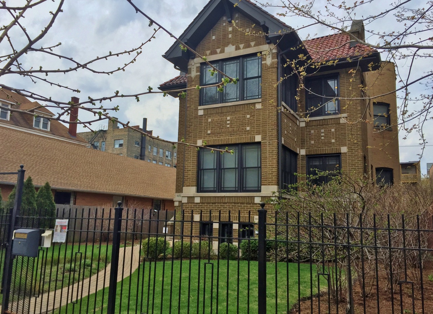 4722 North Malden Street Chicago, IL 60640 - Photo 2 of 42 a front view of a house with a glass windows