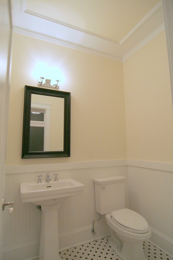 4722 North Malden Street Chicago, IL 60640 - Photo 11 of 42 a bathroom with a toilet a sink and mirror