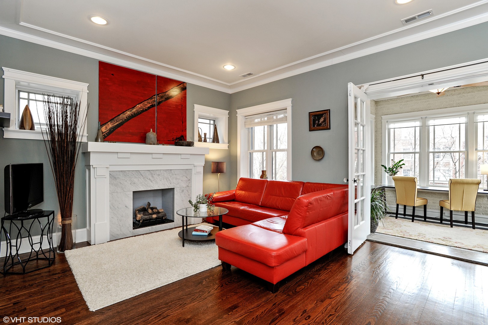 4722 North Malden Street Chicago, IL 60640 - Photo 13 of 42 a living room with furniture and a fireplace