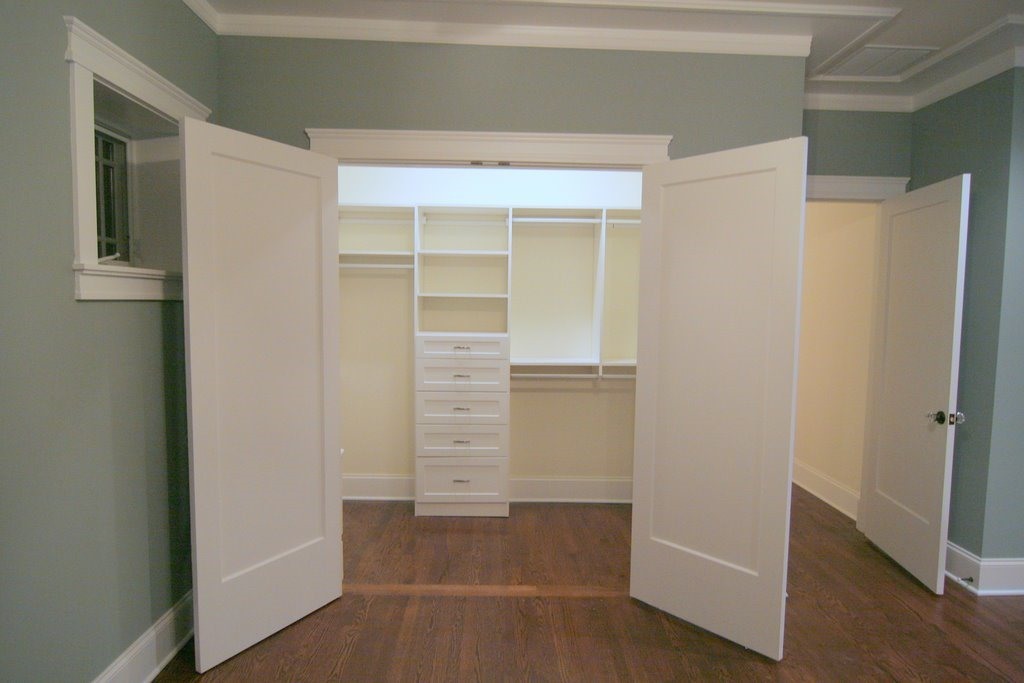 4722 North Malden Street Chicago, IL 60640 - Photo 16 of 42 a view of walk in closet with empty racks