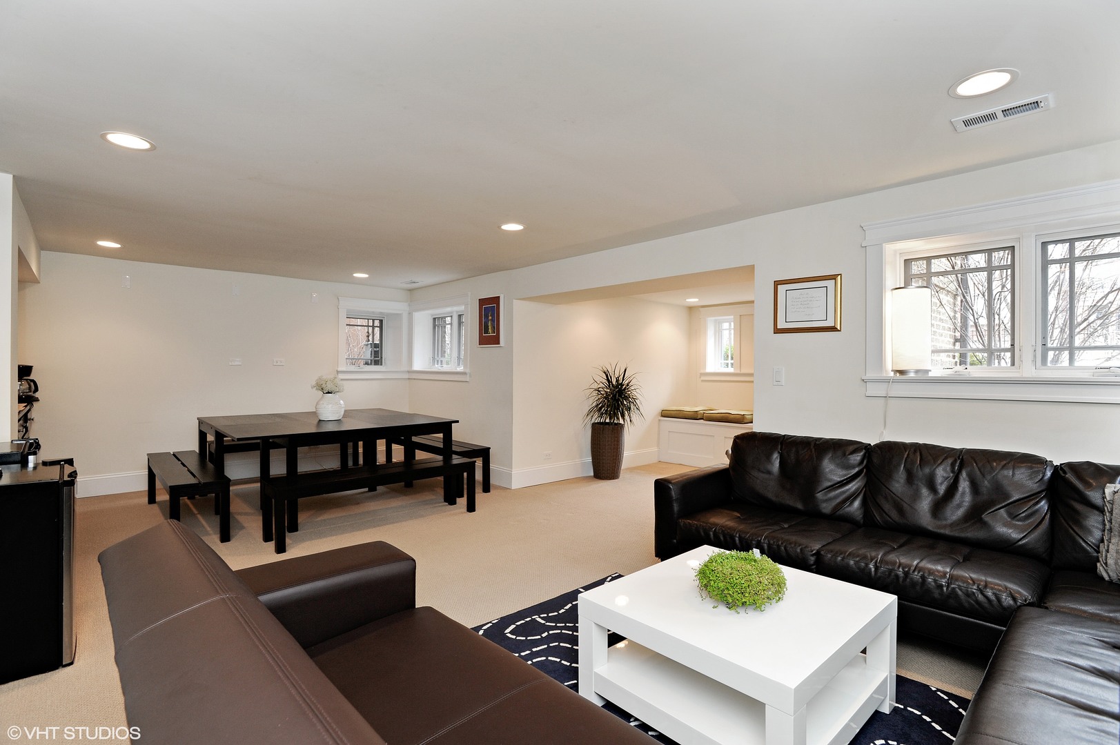 4722 North Malden Street Chicago, IL 60640 - Photo 22 of 42 a living room with furniture and a table