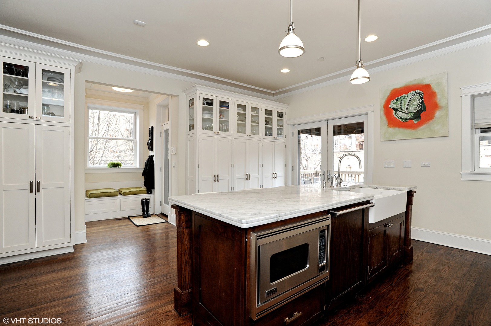 4722 North Malden Street Chicago, IL 60640 - Photo 10 of 42 a kitchen with a stove and wooden floor