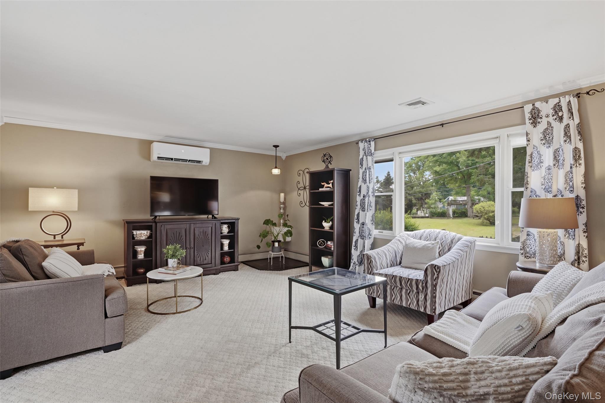 18 Sylvan Road Lake Peekskill, NY 10537 - Photo 15 of 50 Living room with the view of the yard and gardens