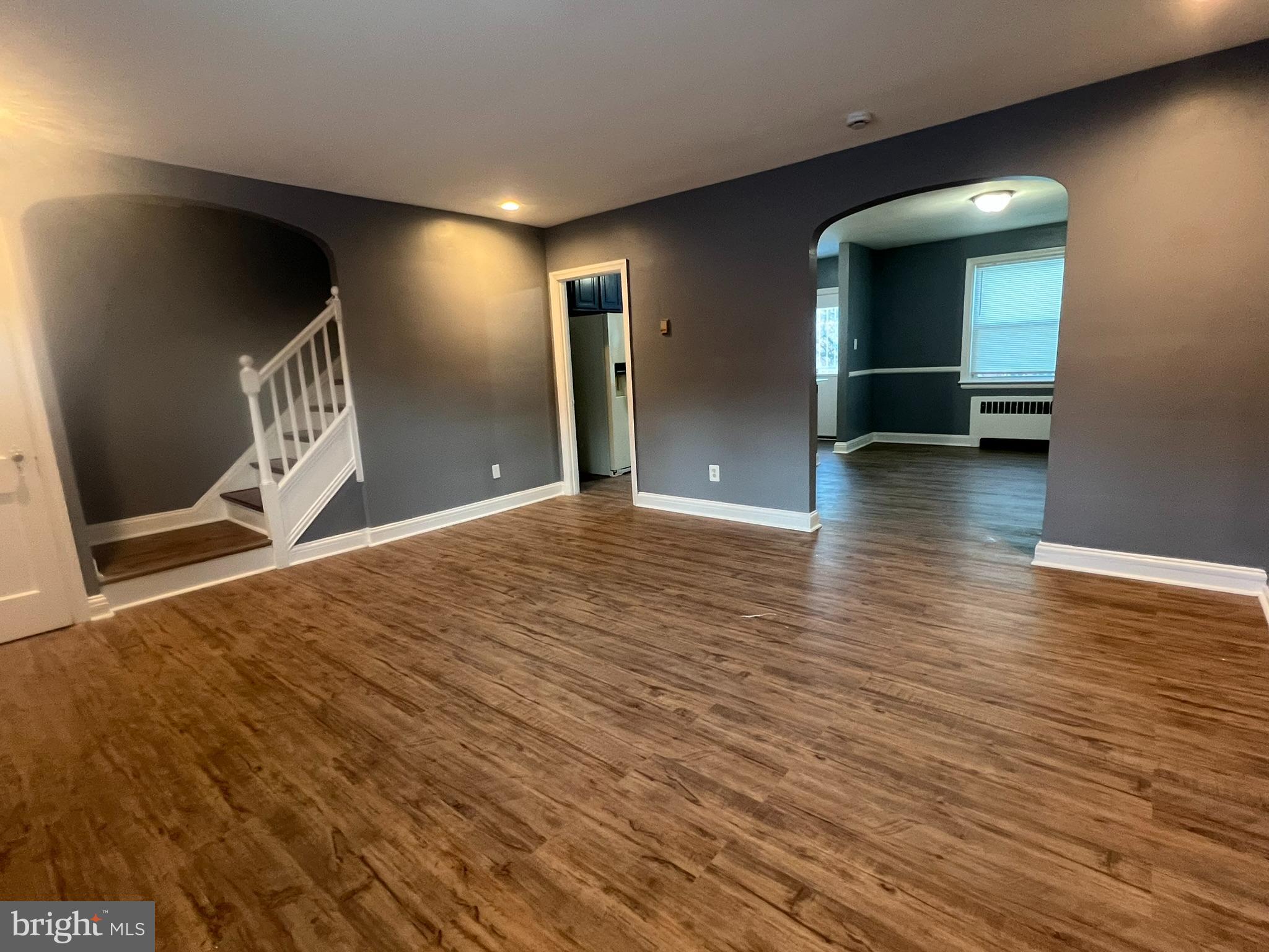3925 Rexmere Road Baltimore, MD 21218 - Photo 3 of 25 a view of a livingroom with wooden floor