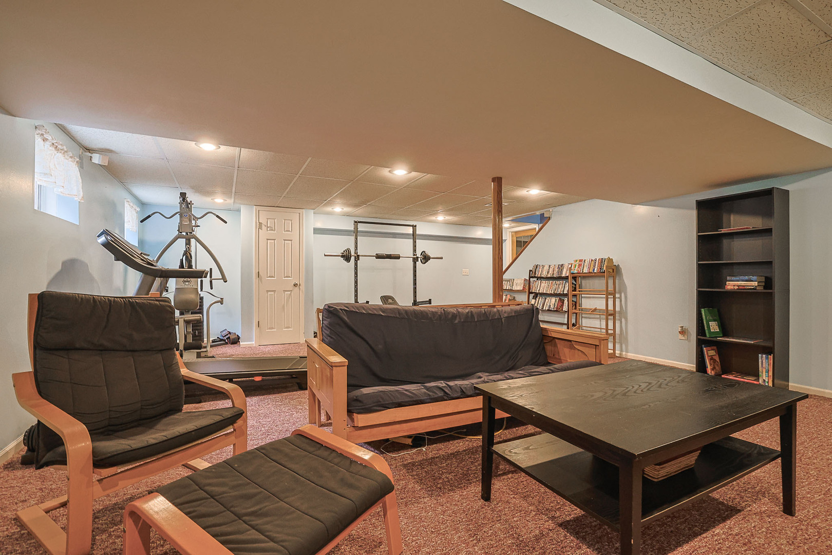 830 Hawk Lane Carol Stream, IL 60188 - Photo 24 of 30 a living room with furniture and a rug