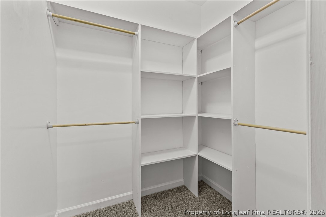 5356 Wade-Stedman Road Wade, NC 28395 - Photo 28 of 38 a view of an empty walk in closet