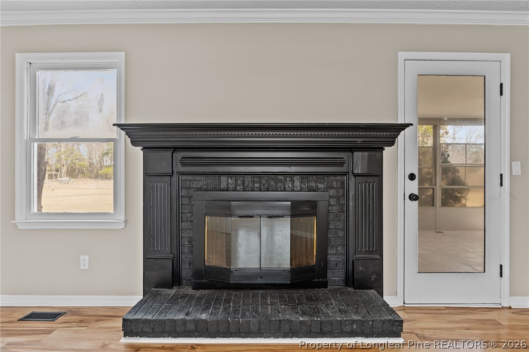 5356 Wade-Stedman Road Wade, NC 28395 - Photo 7 of 38 a view of a livingroom with a fireplace