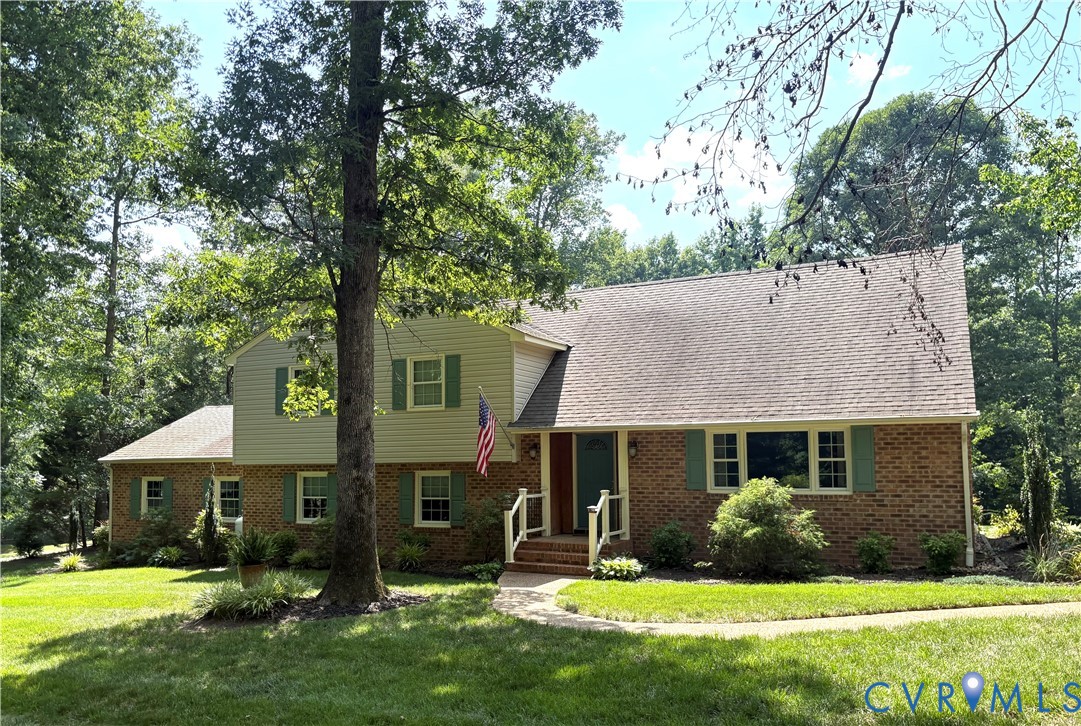 1004 Otterdale Road Midlothian, VA 23114 - Photo 1 of 1 Brick and Vinyl siding exterior a front entry porc