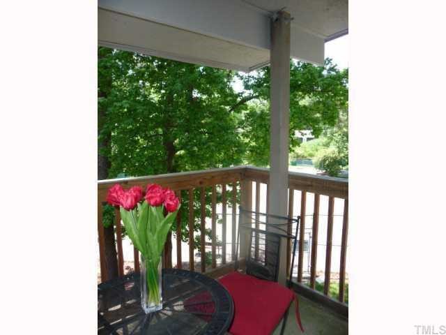 522 Pine Ridge Place Raleigh, NC 27609 - Photo 4 of 12 Deck offers great views of tennis court, lake and pool