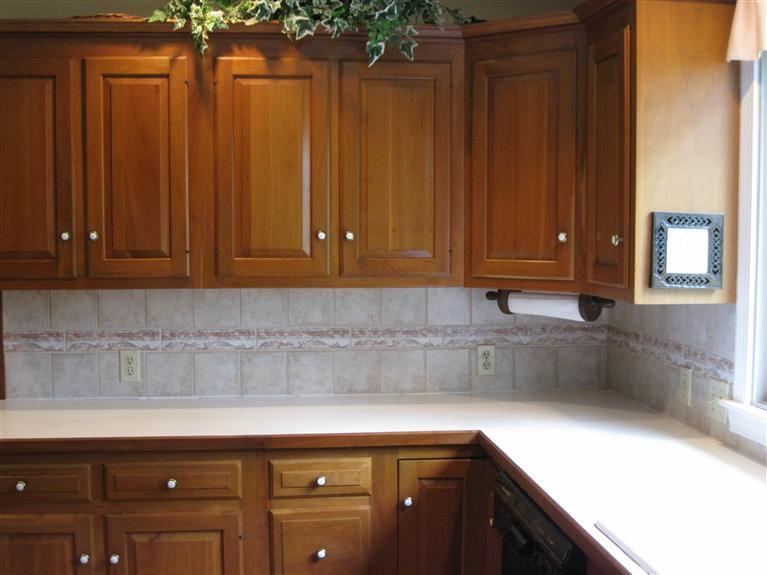 283 Round Cove Road Chatham, MA 02633 - Photo 13 of 24 a kitchen with stainless steel appliances granite countertop wood cabinets and a sink