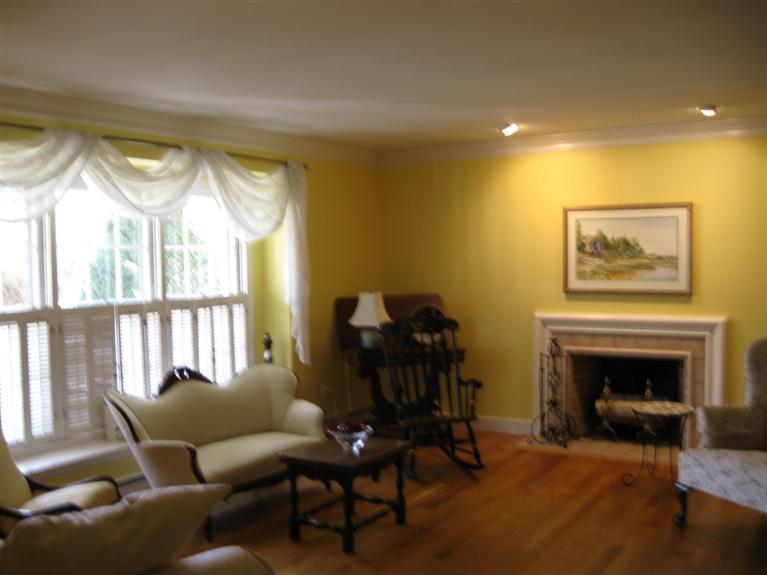 283 Round Cove Road Chatham, MA 02633 - Photo 6 of 24 a living room with furniture and a fireplace
