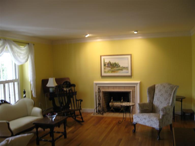 283 Round Cove Road Chatham, MA 02633 - Photo 7 of 24 a living room with furniture and a fireplace