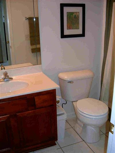The downstairs bathroom has tile floors.