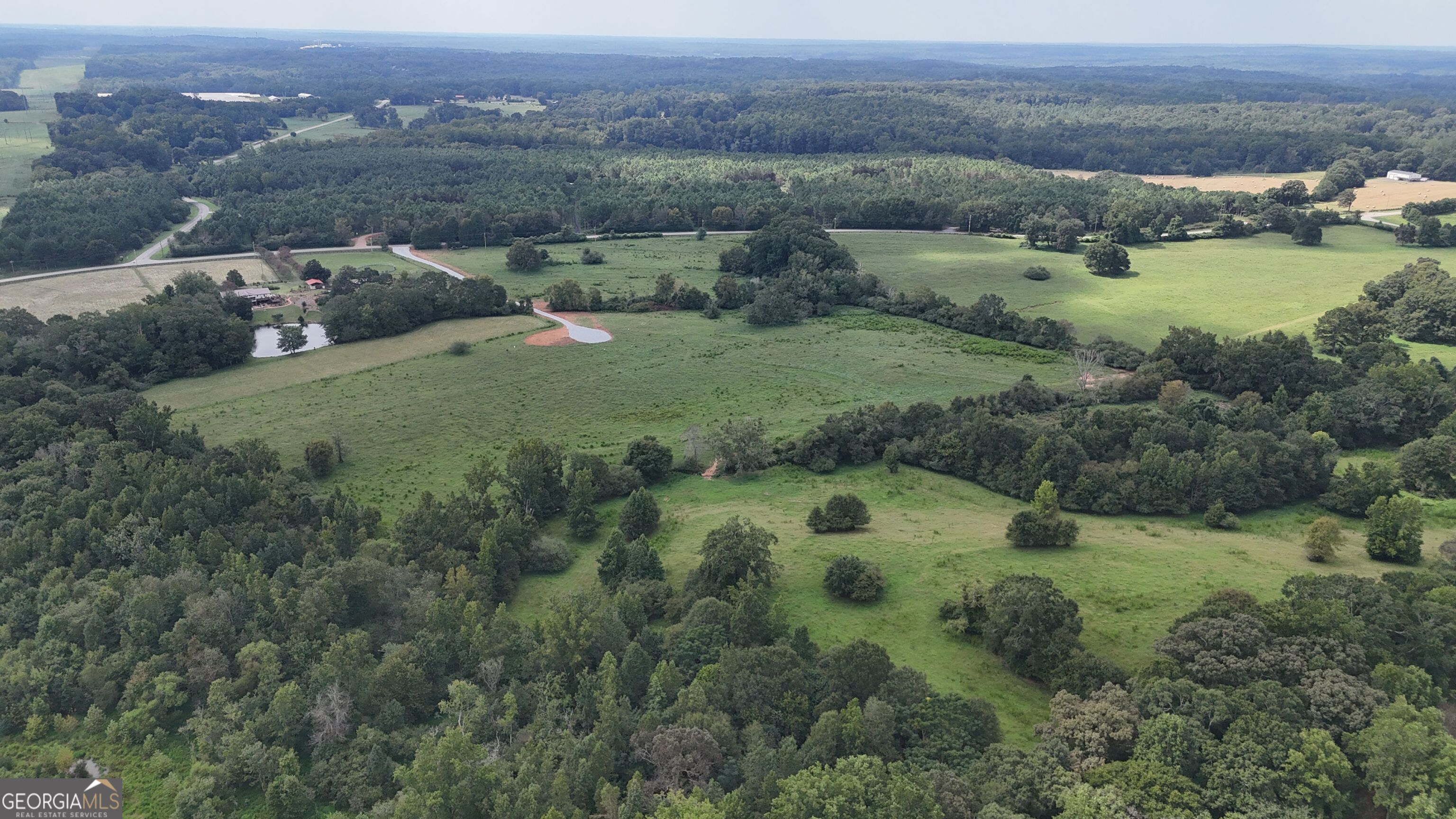 9 Red Rose Road Nicholson, GA 30565 - Photo 43 of 65 an aerial view of a houses with outdoor space and lake view
