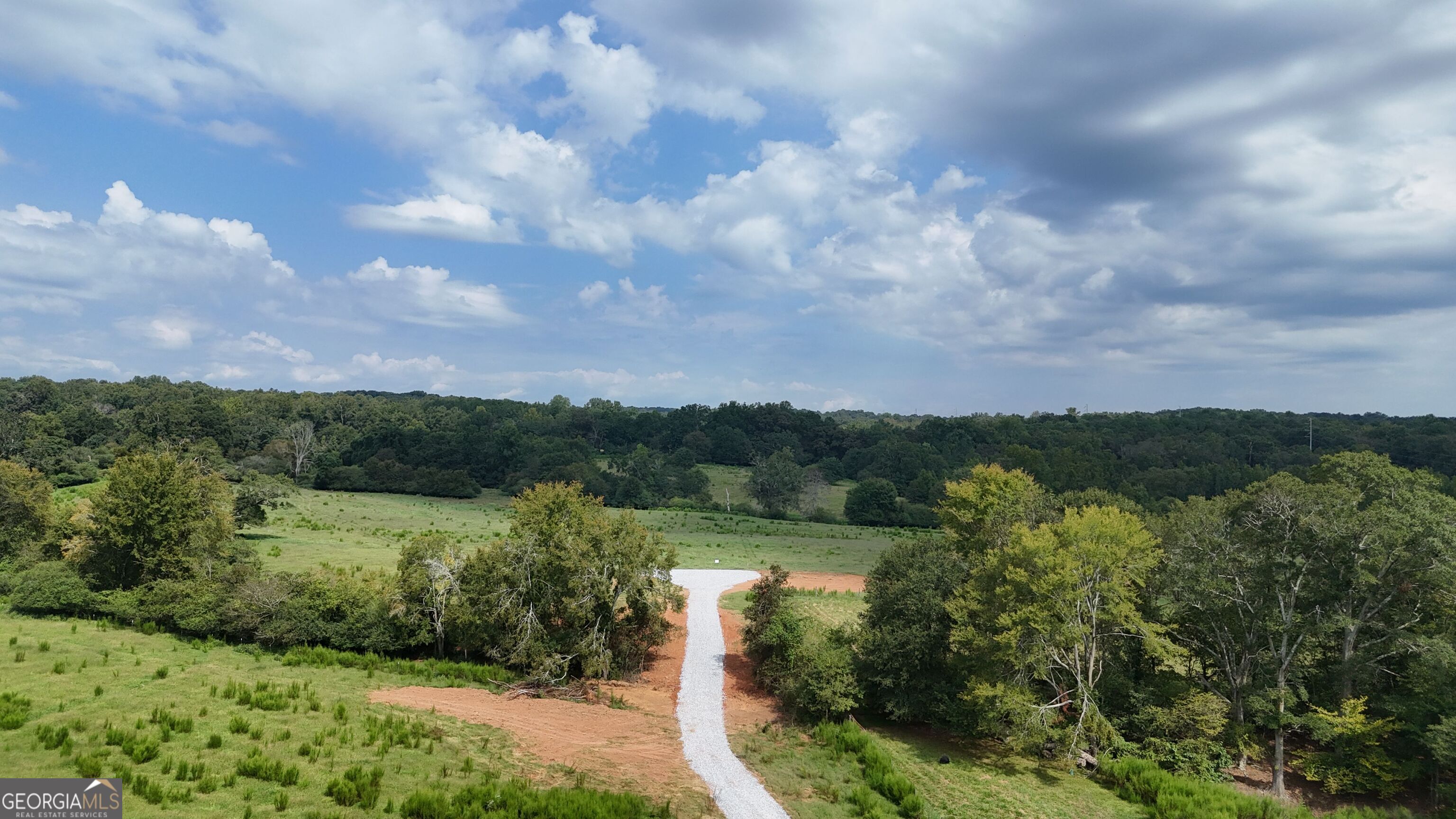 9 Red Rose Road Nicholson, GA 30565 - Photo 61 of 65 a view of a green field with lots of bushes