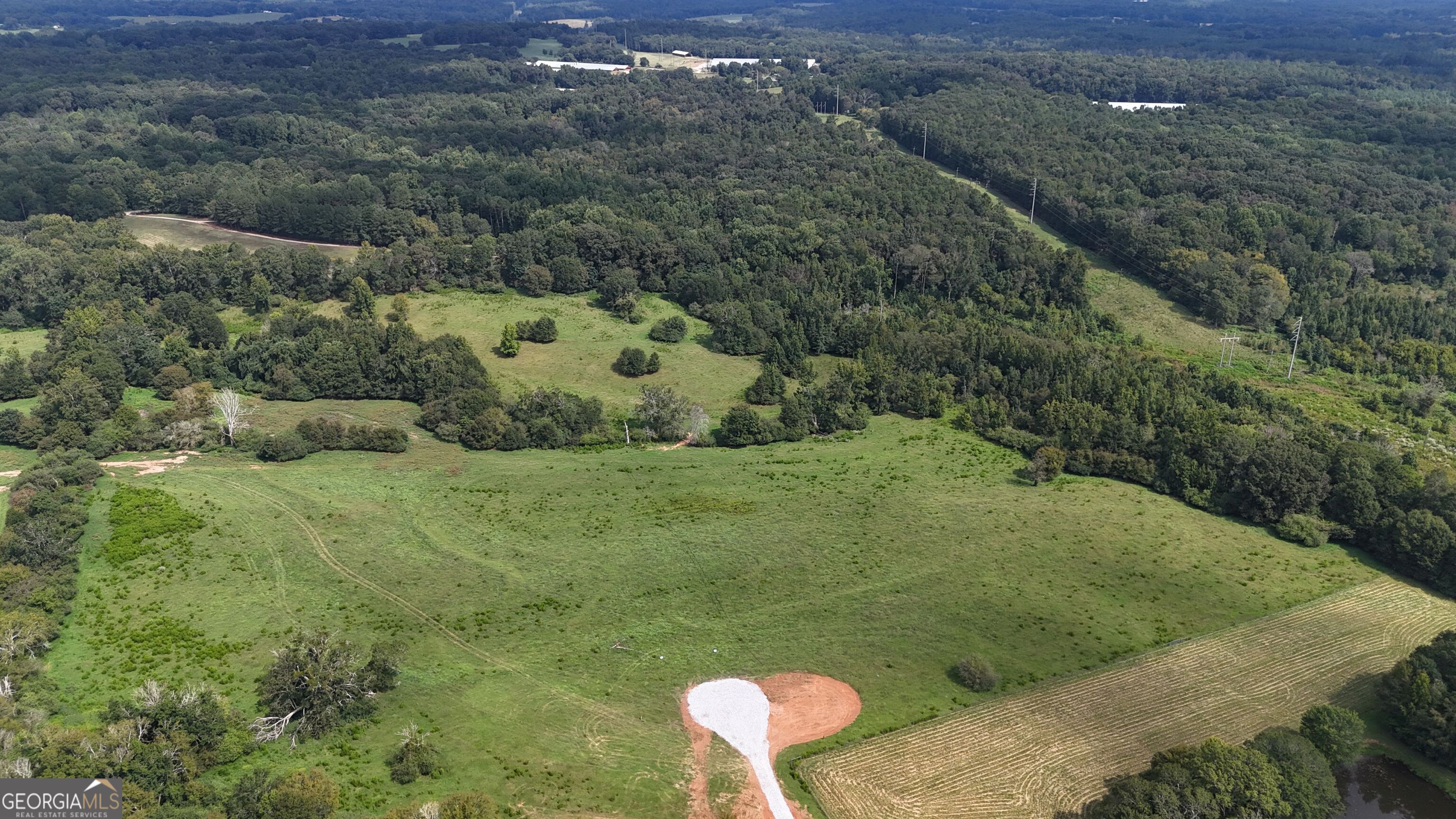 9 Red Rose Road Nicholson, GA 30565 - Photo 62 of 65 a view of a two black and white house