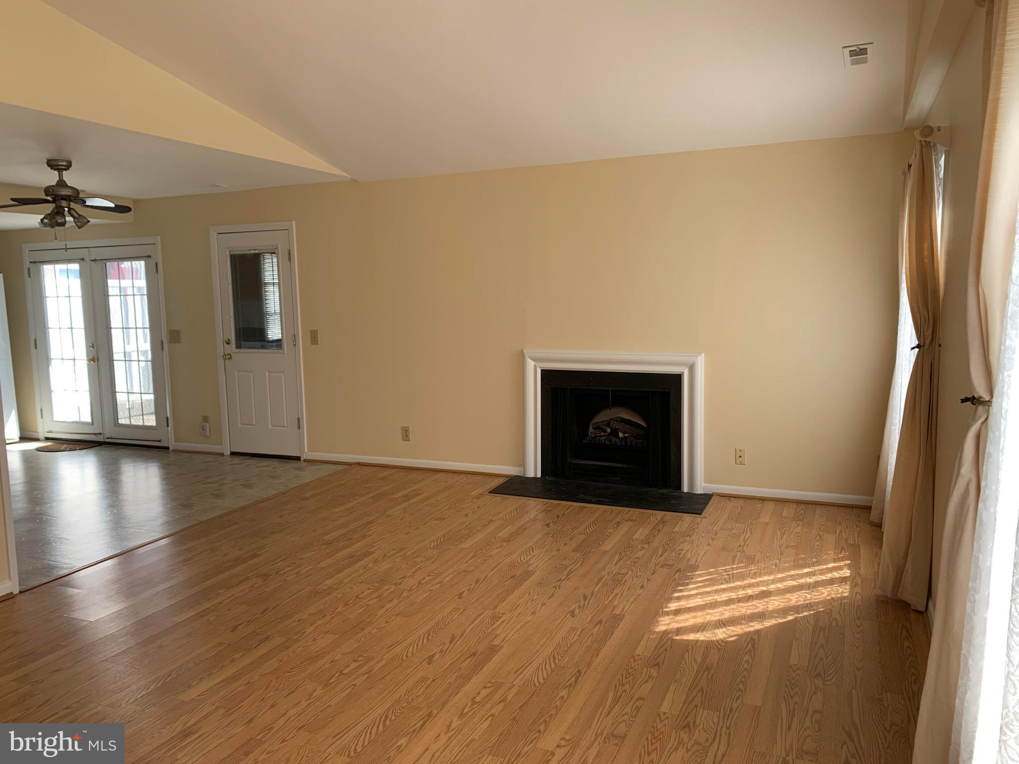 3660 Edelmar Terrace, Unit 119A Silver Spring, MD 20906 - Photo 5 of 19 Living Room with Vaulted Ceiling