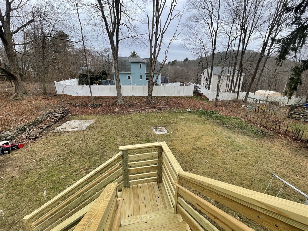 59 High Street Warren, MA 01083 - Photo 30 of 42 a view of a yard with trees
