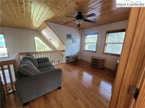 a bed room with a bed and a window