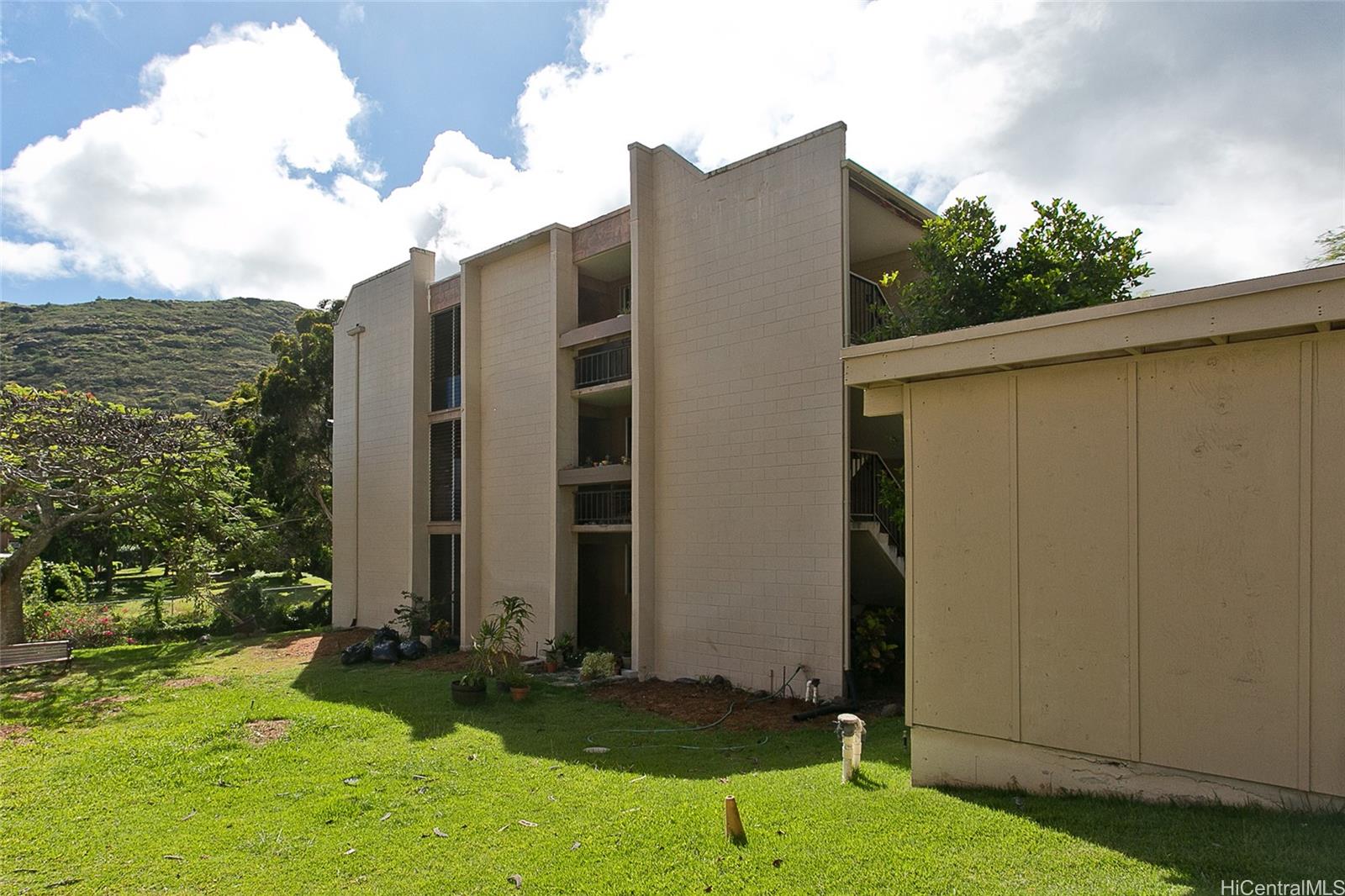 a view of a back yard of the house