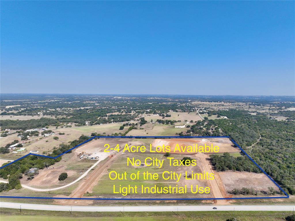 Lot 4 Ric Williamson Memorial Highway Weatherford, TX 76085 - Photo 1 of 3 an aerial view of a city