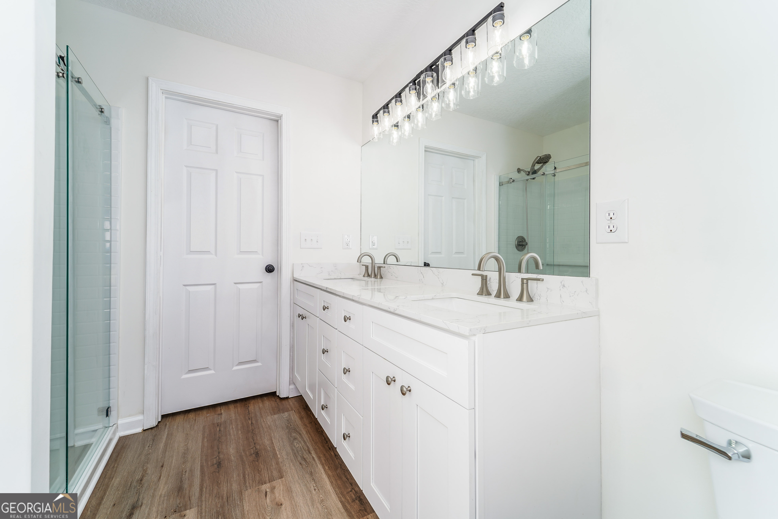 3551 Cason Road Blackshear, GA 31516 - Photo 15 of 24 a bathroom with a sink and a mirror