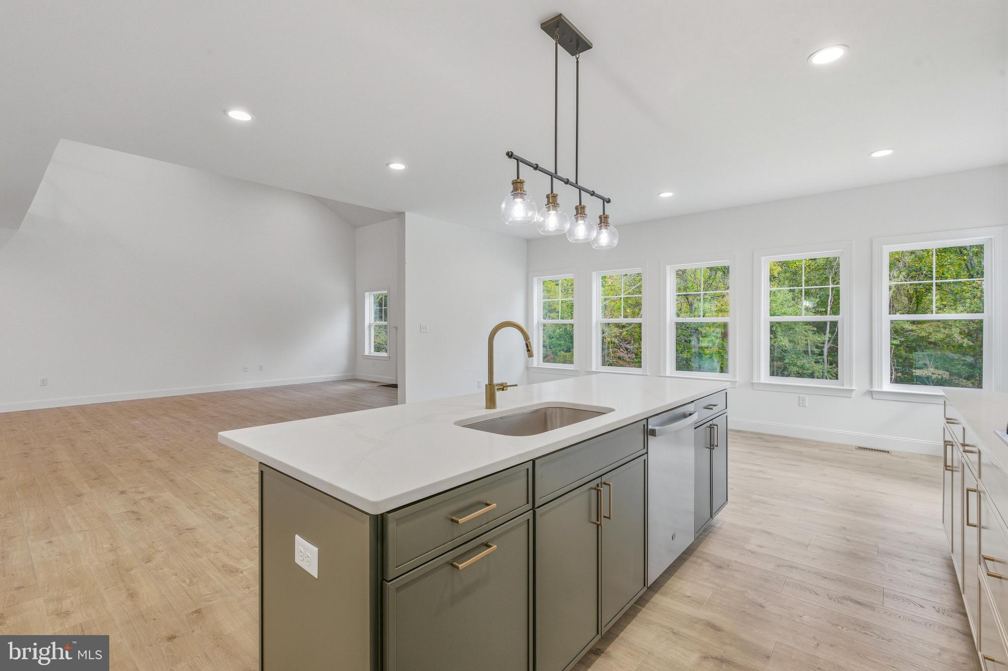 1050 Glen Hall Road Kennett Square, PA 19348 - Photo 13 of 42 a view of a kitchen with a sink and windows