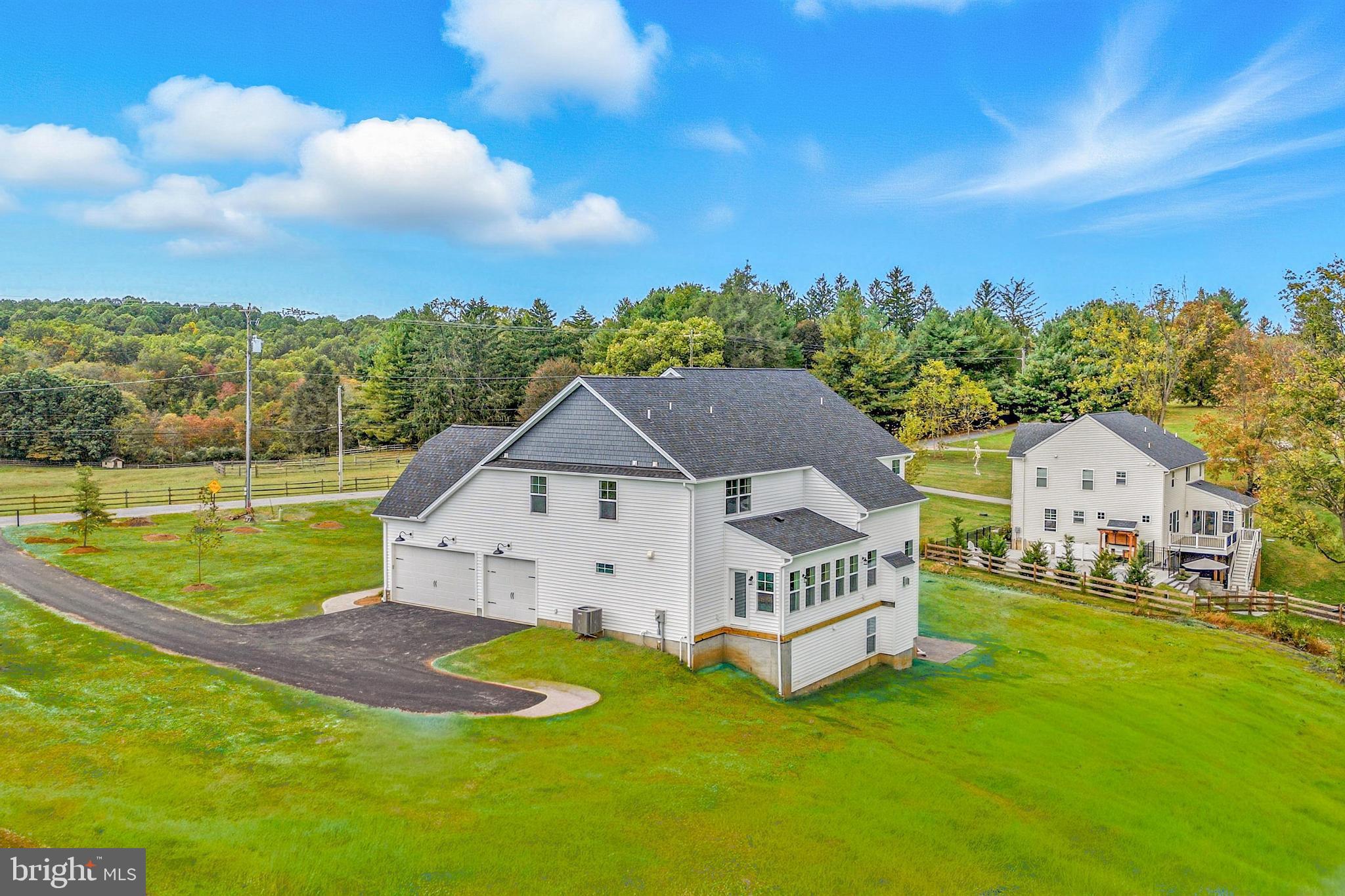 1050 Glen Hall Road Kennett Square, PA 19348 - Photo 2 of 42 a view of a house with a yard