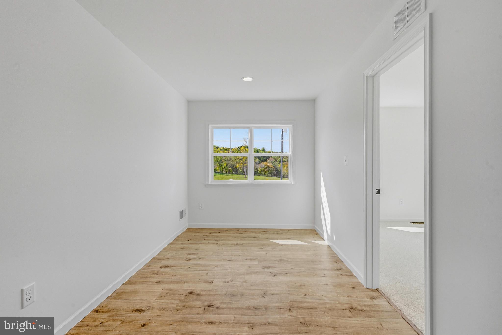 1050 Glen Hall Road Kennett Square, PA 19348 - Photo 23 of 42 a view of an empty room with a window