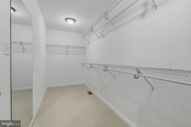 a view of a room with racks on the wall